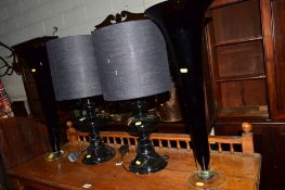 A PAIR OF MODERN BLACK GLASS TABLE LAMPS with shades, together with two glass vases (4)