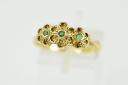 A LATE 20TH CENTURY EMERALD FLORAL DESIGN RING, ring size P, hallmarked 9ct gold, approximate