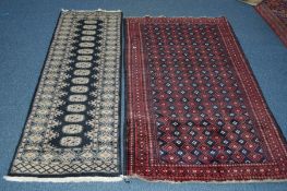 A 20TH CENTURY YOMUT RUG, red and blue ground, 181cm x 103cm, together with modern rug (2)