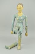 A PAINTED COMPOSITION JOINTED LADY FIGURE, modelled in a seated position in the 19th Century style ,