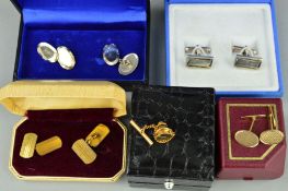 A CUFFLINK AND TIE PIN COLLECTION to include a late 20th Century 9ct gold pair of oval cufflinks,