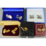 A CUFFLINK AND TIE PIN COLLECTION to include a late 20th Century 9ct gold pair of oval cufflinks,