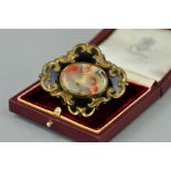 A LATE VICTIORIAN BROOCH, the gold plated brooch with replacement oval agate centre panel within a