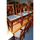 A SET OF TEN REPRODUCTION REGENCY STYLE DINING CHAIRS including two carvers