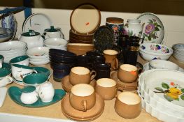 DENBY 'GREENWHEAT' PART DINNERWARES, to include two teapots (sd), bowls, cups, saucers (sd), other