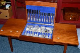 AN ELKINGTON PLATE CANTEEN OF CUTLERY, for eight settings, housed in a low teak table, length