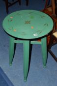 A CIRCULAR PAINTED OCCASIONAL TABLE