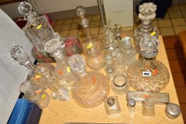 VARIOUS GLASS DECANTERS, COSMETIC BOTTLES etc, to include a ship's cut glass decanter with silver