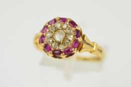 A LATE VICTORIAN 18CT GOLD RUBY DIAMOND AND PEARL ROUND CLUSTER RING, centering on a pearl
