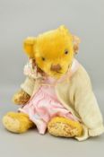A GOLDEN PLUSH TEDDY BEAR, possibly Invicta, glass eyes, brown vertical stitched nose, jointed body,