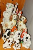 A GROUP OF STAFFORDSHIRE POTTERY, etc to include seated dogs, etc (sd) (12)