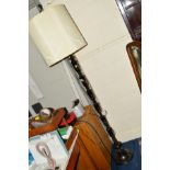 A METAL FRAMED JAPANESE STYLE STANDARD LAMP with a cylindrical shade, height 183cm
