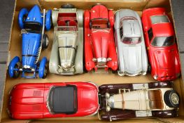 A QUANTITY OF UNBOXED BURAGO AND POLISTIL 1/16 AND 1/18 SCALE SPORTS CAR MODELS, all appear complete