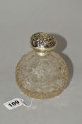 AN EDWARDIAN SILVER TOPPED SPHERICAL GLASS SCENT BOTTLE, screw fitting, no inner stopper and neck