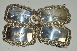 A SET OF THREE ELIZABETH II SILVER DECANTER LABELS, Martini, Rum and Vodka, maker Richards & Knight,