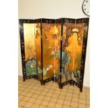 A 20TH CENTURY JAPANESE BYOBU SIX FOLD DOUBLE SIDED SCREEN, gilt and ebonised ground, the panels