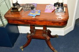 A VICTORIAN MAHOGANY FOLD OVER CARD TABLE, fold over top revealing green baize interior, above