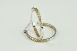 A PAIR OF DIAMOND HOOP EARRINGS set with brilliant cut diamonds to the front half of the hoop and