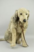 A LARGE MODERN SITTING SOFT TOY DOG, grey plush hound, plastic eyes, leather covered nose and eye