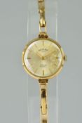 AN EARLY 20TH TO MID 20TH CENTURY 9CT GOLD LADIES ROTARY WATCH, silvered dial with baton hour