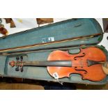 A CASED VIOLIN AND BOW, two piece back, paper label 'Antonius Stradivarius'