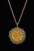 A GOLD SOVEREIGN PENDANT, the Edward VII 1904 sovereign within an openwork surround to the tapered