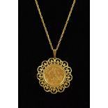 A GOLD SOVEREIGN PENDANT, the Edward VII 1904 sovereign within an openwork surround to the tapered