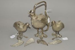 A SET OF THREE WHITE METAL FLASKS OF BIRD AND SERPENT FORM, the open beaks forming the pouring lips,