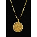 A 9CT GOLD SOVEREIGN PENDANT, the Edward VII 1909 half sovereign within a diamond cut and rope twist