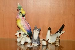 A ROYAL COPENHAGEN CAT, No1803, height 13.5cm, a USSR seagull, a Poole mouse, height 6.5cm, a Karl