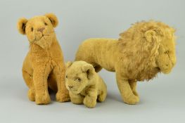 A JUNGLE TOYS OF LONDON GOLDEN PLUSH LION CUB, glass eyes, felt nose, label to belly, length