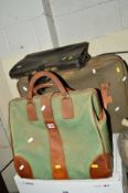 A VINTAGE GLADSTONE BAG, two other bags and two suit bags (6)