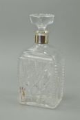 A CUT GLASS DECANTER, with 'Sterling' silver collar, height 21.5cm
