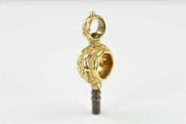 A LATE GEORGIAN WATCH KEY, the grip with floral and foliate decoration, length 34mm