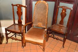A PAIR OF GEORGIAN OAK SPLAT BACK HALL CHAIRS, together with an Edwardian oak cane back elbow