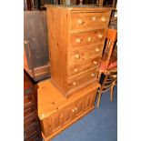 A TALL PINE CHEST OF FIVE DRAWERS and a pine two door cabinet (2)