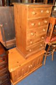 A TALL PINE CHEST OF FIVE DRAWERS and a pine two door cabinet (2)