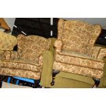 A PAIR OF FLORAL UPHOLSTERED VICTORIAN WING BACK ARM CHAIRS (2)