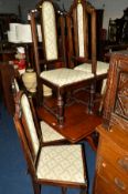A SET OF SIX EARLY 20TH CENTURY OAK DINING CHAIRS