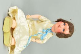 A BISQUE HEAD DOLL, nape of neck marked 'L4 Germany', sleeping eyes, open mouth showing four