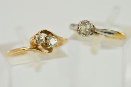 TWO DIAMOND RINGS, the first of cross over design claw set with two old cut diamonds, stamp