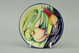 A MOORCROFT POTTERY PIN DISH, 'Orchid Arabesque' pattern by Emma Bossons, impressed marks and
