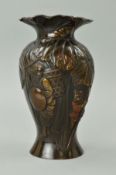 A BRONZED JAPANESE VASE, mother and child in foliage, height 17.5cm