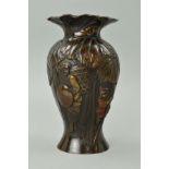 A BRONZED JAPANESE VASE, mother and child in foliage, height 17.5cm