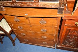 AN EDWARDIAN MAHOGANY AND INLAID CHEST of two short and three long drawers with a bow front top,