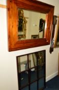 A MODERN HARDWOOD WALL MIRROR, 110cm x 90cm, together with another wall mirror (2)