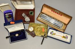 A SELECTION OF ITEMS to include a cased 64 Professional harmonica, a cased gentleman's Bulova quartz