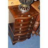 A SMALL REPRODUCTION MAHOGANY CHEST of six drawers