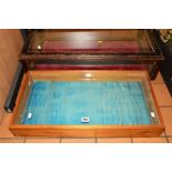 TWO TABLE TOP DISPLAY CASES, largest with hinged lid, length 73cm x width 41cm x depth 18cm,