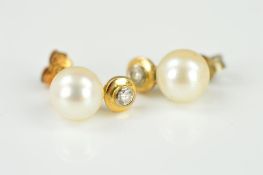 A PAIR OF CULTURED PEARL AND DIAMOND EARRING STUDS, each designed as a cultured pearl with a